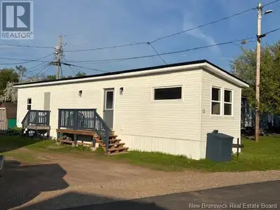 OPEN HOUSE SATURDAY MAY 31, 2025 12:30 pm to 2 pm:0) This 2 bedroom mini home was completely refurbi...