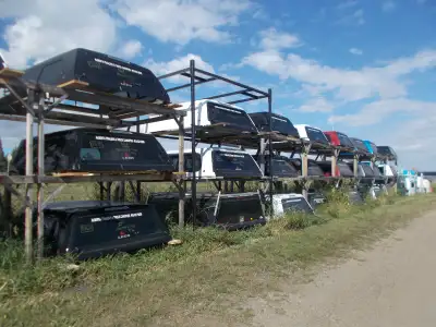 ALBERTA TRAILERS & TRUCK CANOPIES 4004 42nd Ave INNISFAIL, AB All LEER fiberglass canopies are cab h...