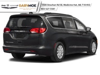 The 2026 Chrysler Grand Caravan SXT in a captivating black hue is the front-wheel drive van designed... (image 1)