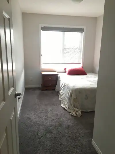 Airdrie a furnished bedroom for rent nearby Costco and CrossIron