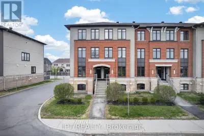 Welcome to this beautifully maintained upper-level end-unit stacked condo in the heart of Avalon, on...