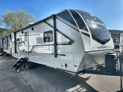 We are looking for good pre owned Rv's to buy or consign!! Keystone Cougar Half-Ton travel trailer 2...