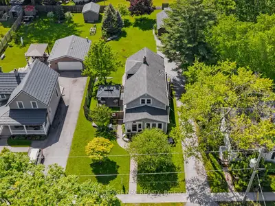 Discover the charm of 457 North Mill. This 1.5-storey detached century home is situated on a generou...