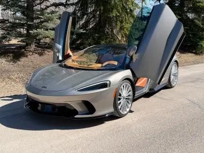 The Gentleman's Supercar! This exceptional spec, low km stunner is Selling at the 52nd Annual Enthus...