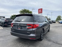Engineered for memorable family journeys, this 2024 Honda Odyssey Touring in sophisticated Modern St... (image 4)