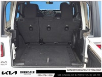 The 2022 Jeep Wrangler Unlimited Willys 4x4 in a classic white exterior and rugged 44 drivetrain is... (image 5)