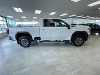 The 2024 GMC Sierra 2500HD SLE is a powerful and refined heavy-duty truck built for serious towing,... (image 6)