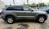 **CARS TRUCKS SUV 4X4 VAN AWD EDMONTON FINANCING AVAILABLE EASY FINANCING ** 2012 JEEP GRAND CHEROKE... (image 1)