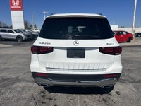 This 2023 Mercedes-Benz GLB 250 Sport Utility, presented in crisp Polar White, redefines compact lux... (image 5)