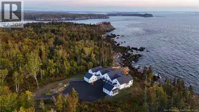 The rugged beauty of Campobello Island perfectly compliments this majestic, modern estate, which sit...