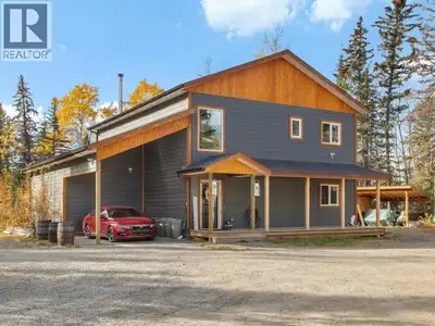 This quintessential family home sits on 2.59 acres and features 4 bedrooms plus a den, 2.5 bathrooms...