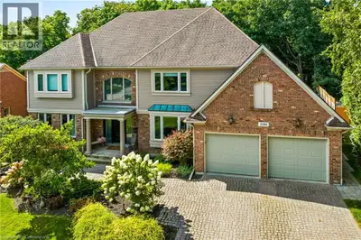 Nestled among mature trees, this stunning 3,840 sq. ft. Tyandaga home is an entertainer’s paradise....