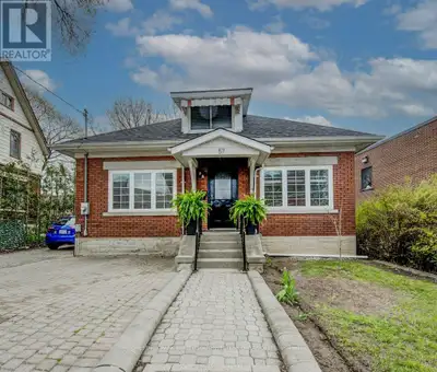 This inviting brick duplex offers a unique blend of charm, functionality, and opportunity. The upper...