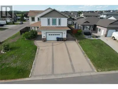 Prestigious neighbourhood AND a ""Custom Built"" 2 storey 5 bedroom HOME! PLUS a fully fenced yard a...