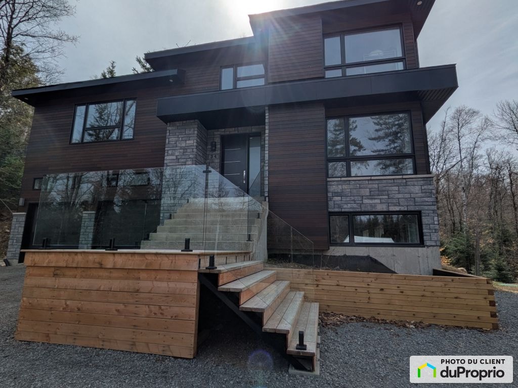 $899,000 - 2 Storey for sale in Ste-Anne-Des-Lacs — photo 1