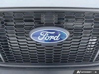 The 2026 Ford Transit Cargo Van in a crisp white finish is ready to tackle your toughest jobs with i... (image 6)