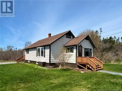 AFFORDABLE AND WELL KEPT ISLAND HOME! Located in the village of Woodwards Cove and on just under hal...