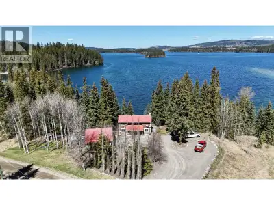 Nestled on a quiet bay along the crystal-clear waters of Bridge Lake, this stunning 3-4 bedroom, 3 b...