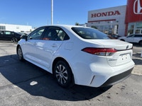 Navigate your daily commute with exceptional efficiency and advanced safety in the pristine white 20... (image 6)