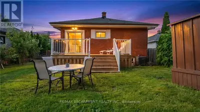 Welcome to this beautifully updated solid brick bungalow offering 3 bedrooms, 2 full bathrooms, and...