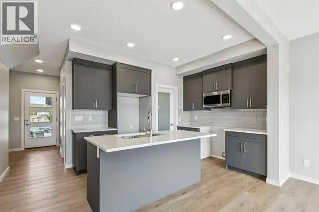382 Heritage Boulevard Cochrane, Alberta in Houses for Sale in Calgary - Image 4