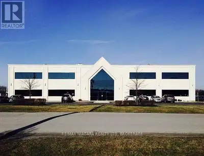 FOR LEASE: Premium Office & Fitness Space with Private Gym Access. Modern Two-Story Commercial Build...