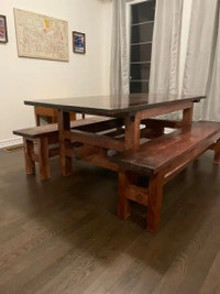 Solid wooden dining table with a matching bench