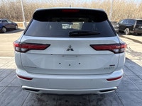 The 2023 Mitsubishi Outlander PHEV is a modern and efficient plug-in hybrid SUV, finished in a clean... (image 6)