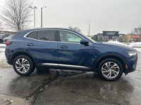 The 2023 Buick Envision Essence, presented in a sophisticated Gray finish, masterfully blends luxuri... (image 2)