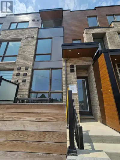 4+2 Bedroom, 4 Bath Stunning Modern Townhouse with Parking Garage and Backyard just steps to Yorkdal...