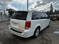 The 2015 Dodge Grand Caravan SXT is a versatile minivan designed to deliver family-friendly comfort,... (image 4)