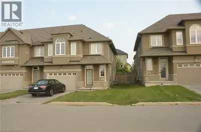 This immaculate end-unit freehold townhome is located in the heart of the Meadowlands, within a well...