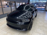 Experience the bold presence and versatility of the 2019 Dodge Durango GT in striking black with an... (image 3)