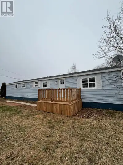 Lovely and bright, three bedroom, one bath mini home in Chateau Estates. Many updates have been comp...