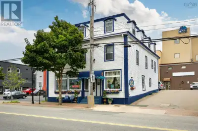 **For Sale: Charming Boutique Hotel with 1800s Character** Nestled in the heart of downtown, this ex...