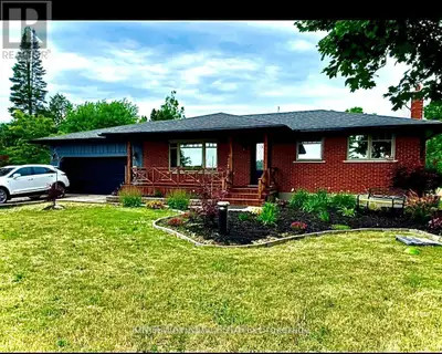 Here's a refined and polished rephrased version: Discover this impeccably maintained 3+1 bedroom, 2-...