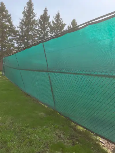 Used Privacy Screen for fence. It is 50 feet X 8 feet high, and another piece 10 feet X 8 feet. All...