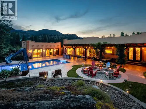 Ten acres in the heart of South Okanagan wine country - a property that genuinely earns the word est...