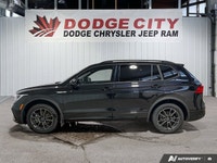 This Volkswagen Tiguan boasts a Intercooled Turbo Regular Unleaded I-4 2.0 L/121 engine powering thi... (image 1)