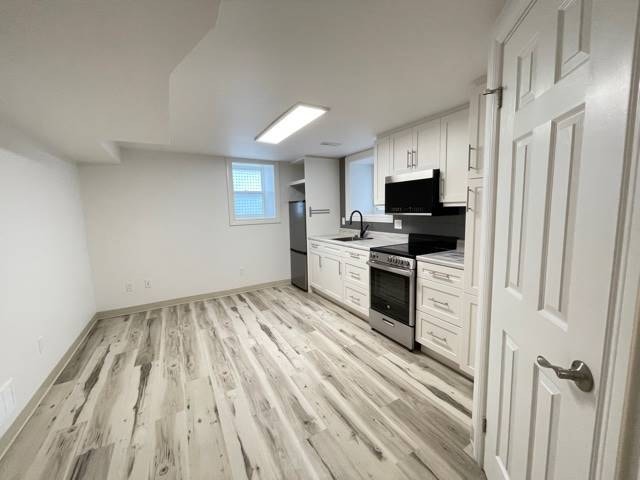 Gorgeous 1 Bedroom Apartment in Midtown! (Unit A-Lower) 2