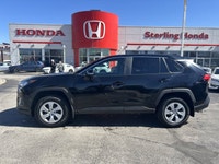 Ready for adventure and the everyday commute, this 2024 Toyota RAV4 LE, presented in striking Midnig... (image 8)