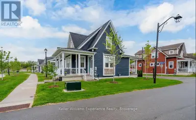 Maintenance-Free Living and Main Floor Living at Its Best! Motivated Seller! Discover this premium s...