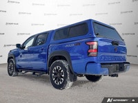 Awarded a 2024 IIHS Top Safety Pick, this striking blue 2024 Nissan Frontier Crew Cab Pickup excels... (image 3)