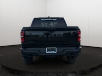 This 2026 RAM 1500 REBEL CREW CAB 4X4 has the following options Lux Leather Trimmed Bucket Seats, Re... (image 5)