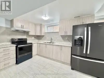 Renovated 3-bedroom, 2-bathroom main level of a 5-level backsplit semi-detached home. Thislevel feat...