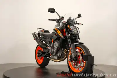 Some motorcycles are built to get you from A to B. The 2021 KTM 890 Duke R is built to make you forg...