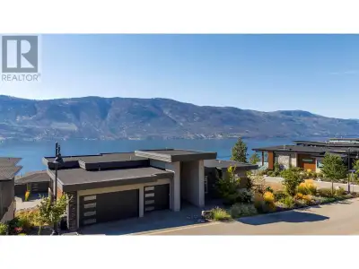 Experience refined living with beautiful Okanagan Lake views from this elegant contemporary home in...