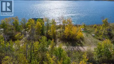 Waterfront on Fowler Lake and still treed, Lot 5 Rose Meadow Drive offers a natural setting with the...