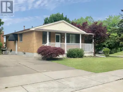 This spacious 3+2-bedroom, 2-full bathroom bungalow sits proudly on a beautifully landscaped corner...
