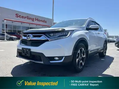 Seamlessly blending sophisticated comfort with dynamic performance, this 2019 Honda CR-V Touring in...